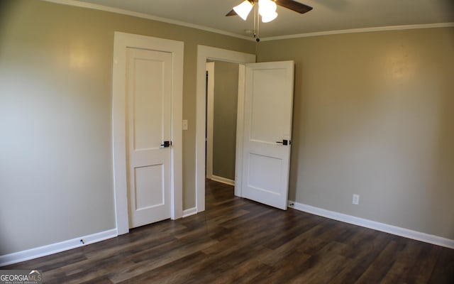 1812 Barnesville Hwy, Thomaston, GA 30286 - unfurnished bedroom with dark wood finished floors, ornamental molding, baseboards, and ceiling fan