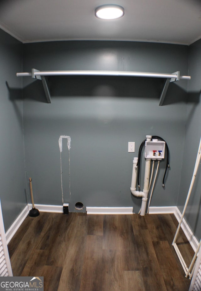 1812 Barnesville Hwy, Thomaston, GA 30286 - laundry room featuring wood finished floors, washer hookup, and baseboards