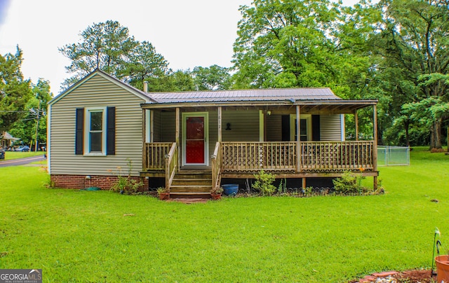 1812 Barnesville Hwy, Thomaston, GA 30286 - view of front of property with a porch, a front lawn, metal roof, and crawl space