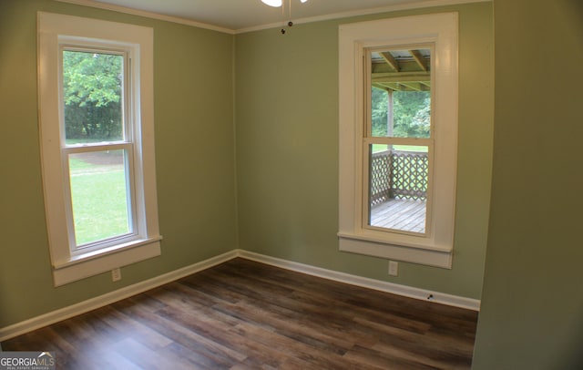 1812 Barnesville Hwy, Thomaston, GA 30286 - empty room with dark wood-style flooring, baseboards, ornamental molding, and ceiling fan