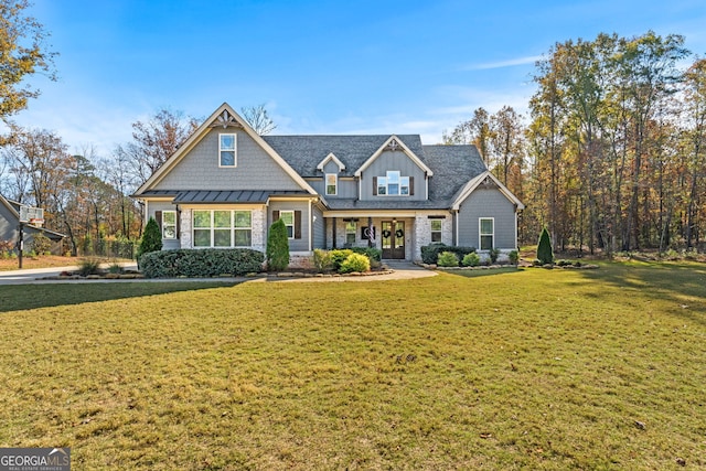 craftsman-style home featuring a front yard