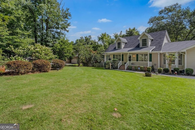 view of front of house featuring a porch and a front yard