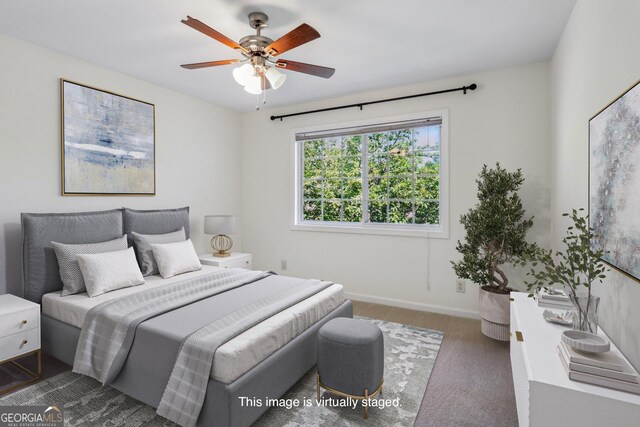 carpeted bedroom featuring ceiling fan