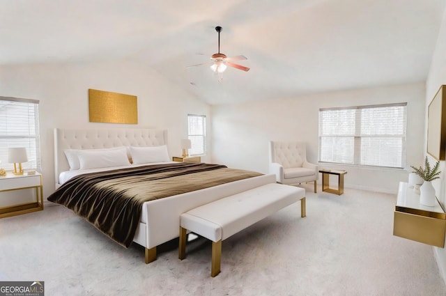 bedroom featuring carpet, ceiling fan, and lofted ceiling