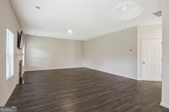 empty room featuring dark hardwood / wood-style floors