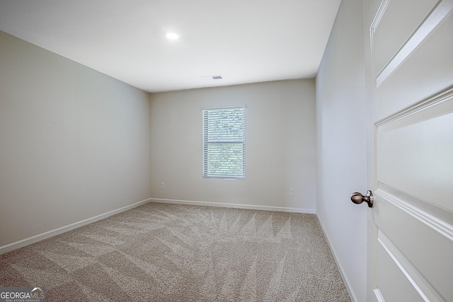 view of carpeted spare room