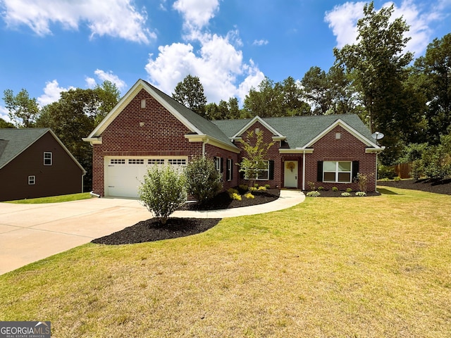 view of front of home with a front lawn and a garage