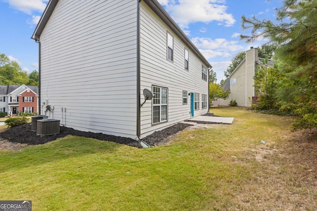 view of home's exterior featuring a yard