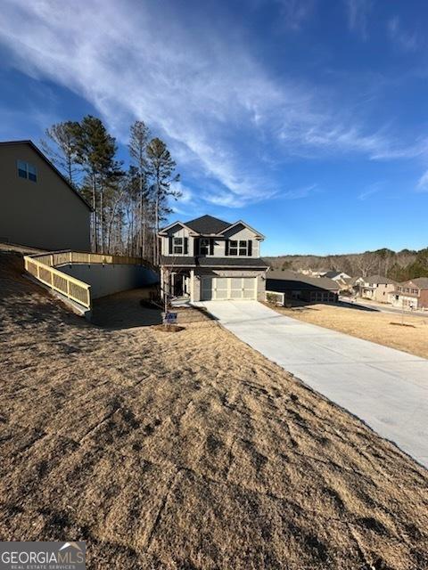 view of front of home with a garage