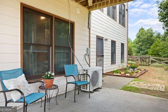 view of patio featuring ac unit