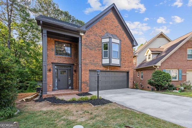 view of front of house featuring a garage and central air condition unit