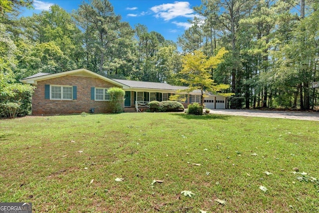 single story home with a garage and a front yard