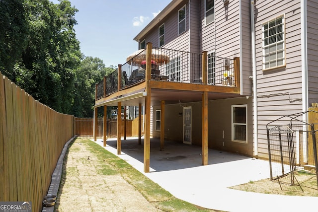 back of house with a patio area