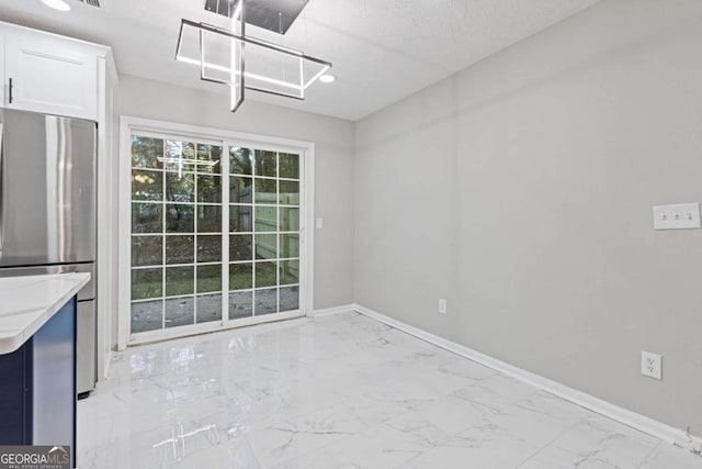 view of unfurnished dining area