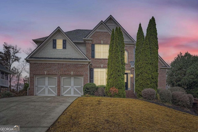 view of front of home with a garage