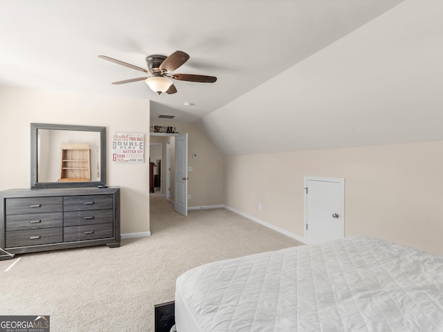 bedroom featuring light colored carpet, ceiling fan, and lofted ceiling