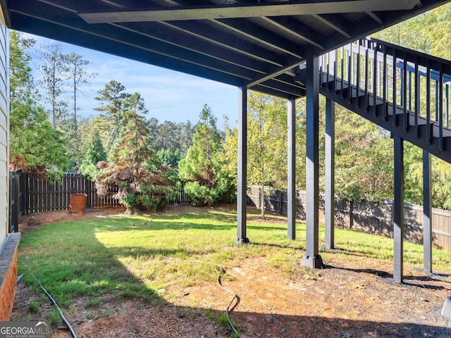 view of yard with a deck