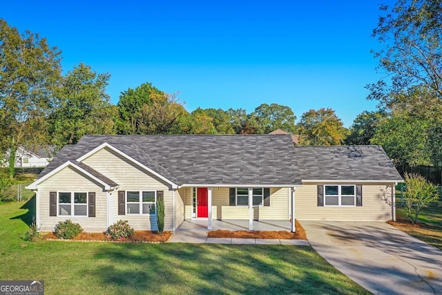 ranch-style home with a front lawn