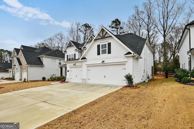 view of side of property with a garage