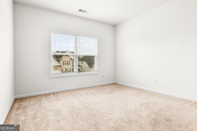 view of carpeted spare room