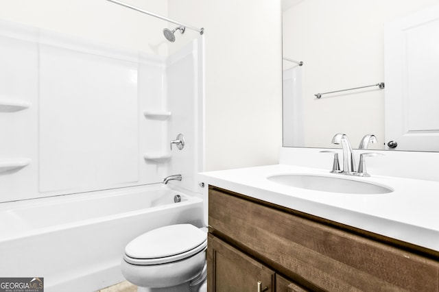 full bathroom featuring vanity, toilet, and washtub / shower combination