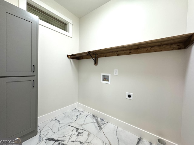 clothes washing area featuring electric dryer hookup and hookup for a washing machine