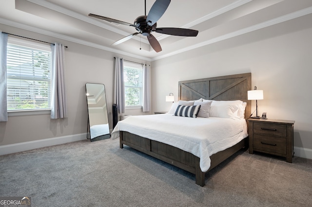 bedroom with multiple windows, light colored carpet, ceiling fan, and crown molding