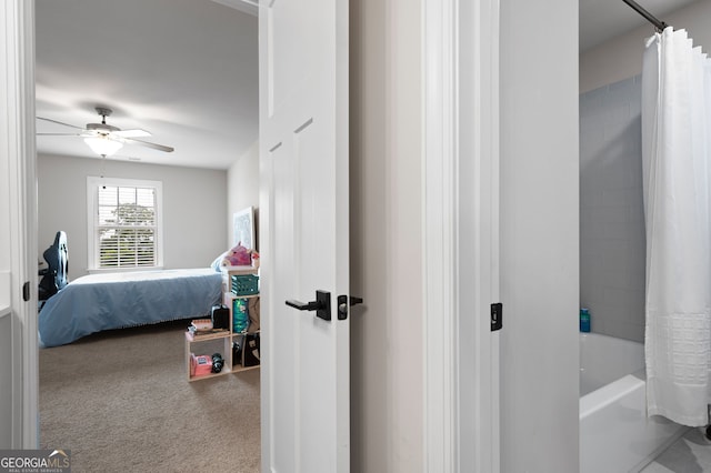 carpeted bedroom featuring ceiling fan