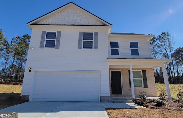 view of front of property featuring a garage