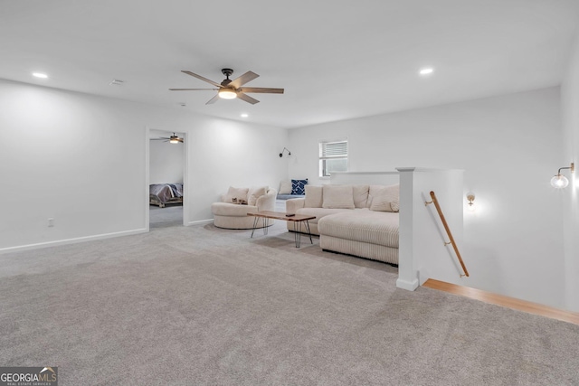 living room with light carpet and ceiling fan