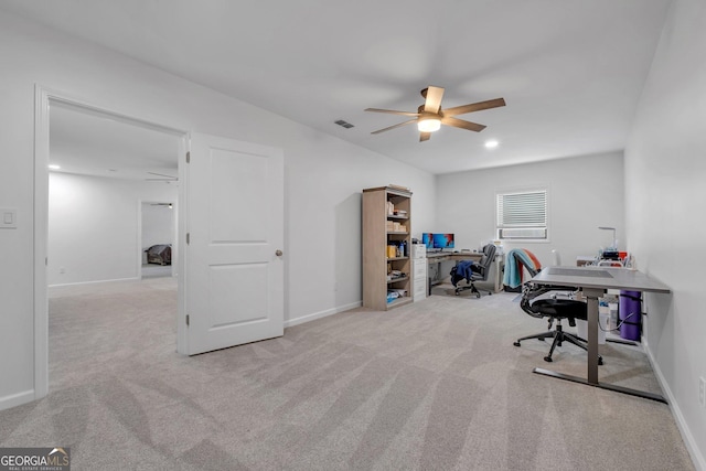 office with ceiling fan and light colored carpet