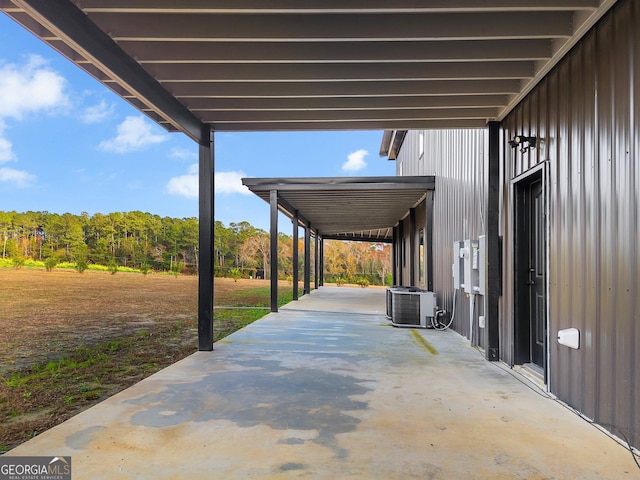 view of patio with central AC unit