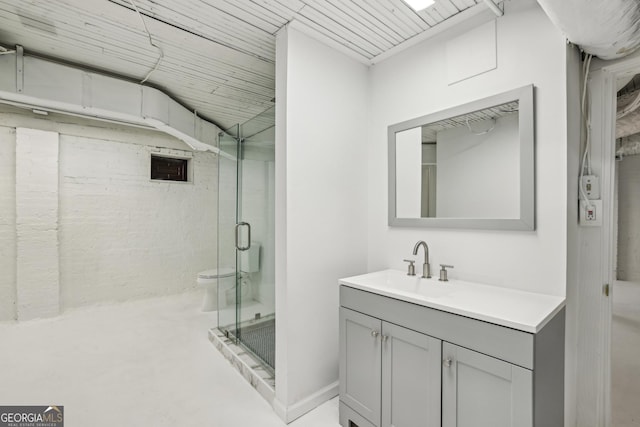 bathroom with vanity, wooden ceiling, a shower with door, toilet, and concrete floors