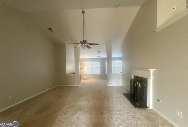 unfurnished living room featuring a ceiling fan, visible vents, baseboards, carpet floors, and a fireplace