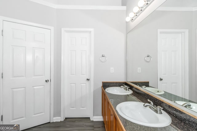 bathroom featuring vanity and hardwood / wood-style flooring