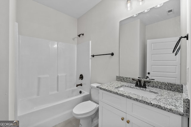 full bathroom featuring tile patterned floors, vanity, toilet, and shower / tub combination