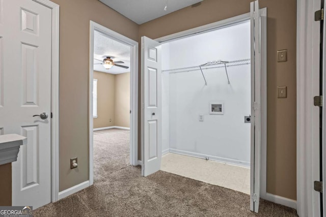 laundry area with washer hookup, ceiling fan, and carpet flooring