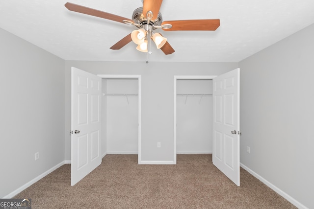 unfurnished bedroom with ceiling fan and light carpet