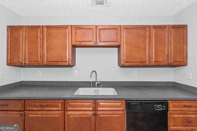 kitchen featuring dishwasher and sink