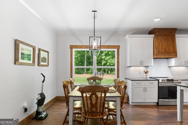 dining area with ornamental molding and dark wood-type flooring