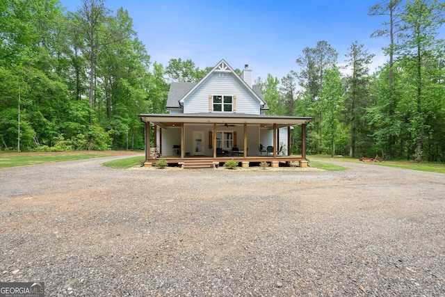 country-style home with covered porch