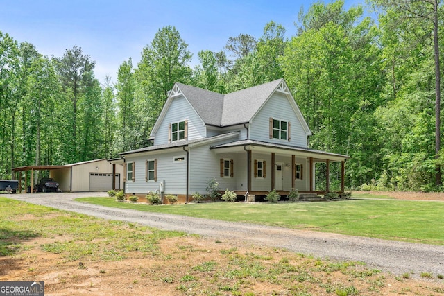 farmhouse-style home with a carport, covered porch, a front yard, and a garage