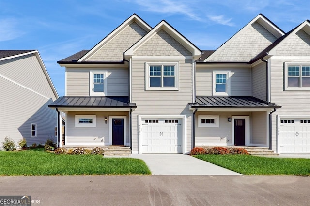 view of front facade featuring a garage and a front yard