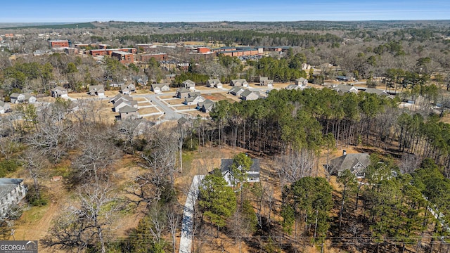 birds eye view of property with a residential view