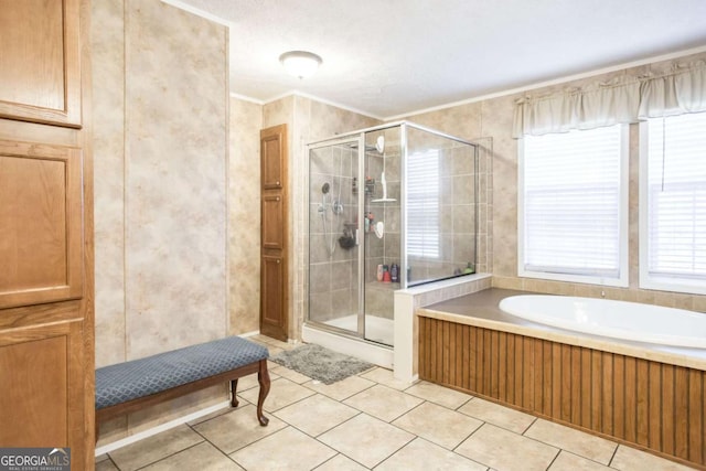 bathroom featuring tile patterned flooring, ornamental molding, a textured ceiling, and shower with separate bathtub