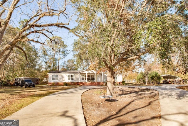 view of front of house featuring a carport