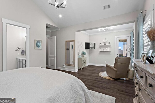 bedroom featuring dark hardwood / wood-style flooring and vaulted ceiling