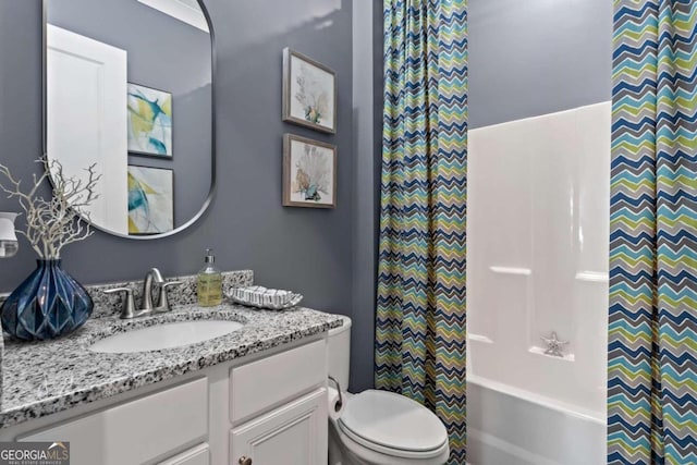 full bathroom featuring vanity, toilet, and shower / bath combo