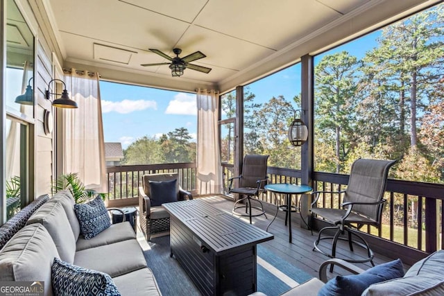 sunroom / solarium with ceiling fan and a wealth of natural light