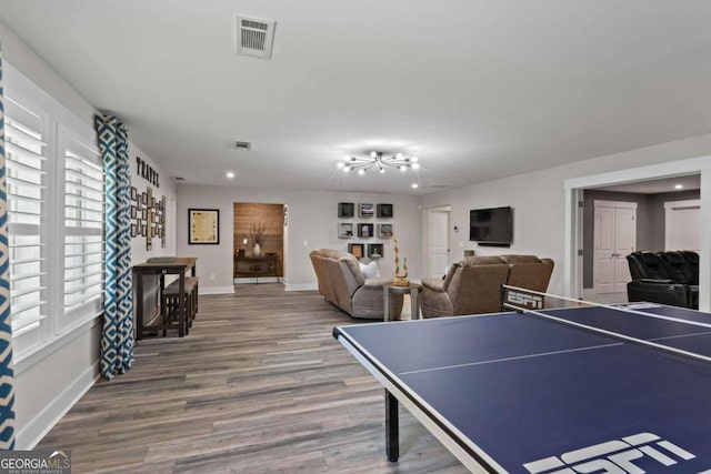 playroom with hardwood / wood-style flooring